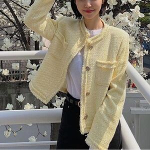 Yellow structured tweed jacket with gold buttons